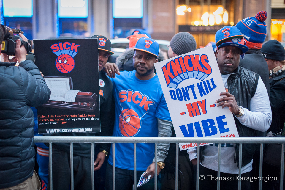 New York, Wednesday, March 19th, 2014. Some people cared more about promoting their brand than the Knicks' struggles. ©Thanassi Karageorgiou